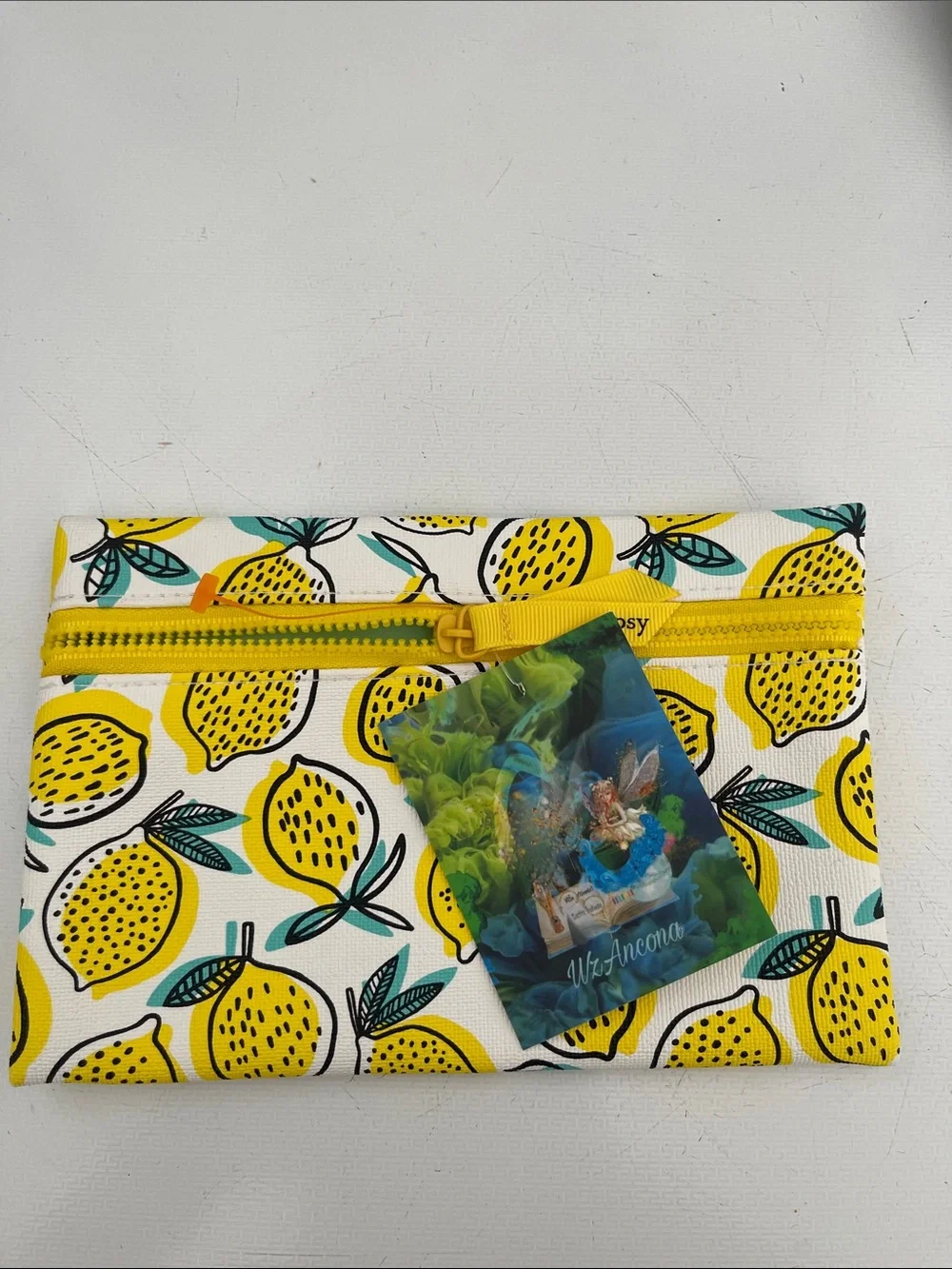 Cosmetic bag, pouch lemon print. By Ipsy material plastic, new
